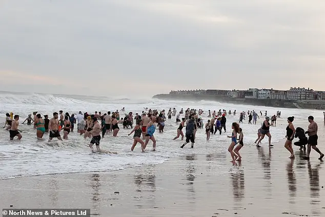 Hundreds Brave Icy Waters for Traditional New Year's Day Dip in North Tyneside