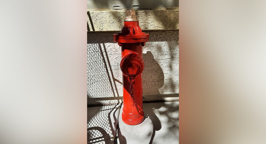 Fire Veteran Defies HOA Order to Keep Iraq War Hydrant Display