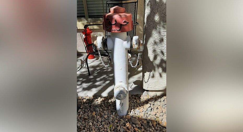 Fire Veteran Defies HOA Order to Keep Iraq War Hydrant Display