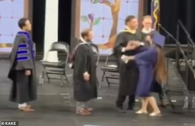 Kansas High School Graduate Forced Into Handshake By Administrator