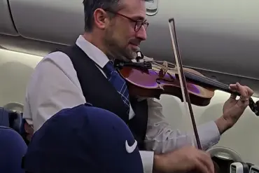 United Airlines Crew Member's Violin Performance Divides Online Opinion