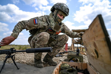 Viral Video Sparks Controversy as Ukrainian Soldiers React to Russian Soldier's 'Katyusha' Performance in Ukraine's Ongoing Conflict, Highlighting Surreal Moment of Humanity