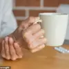 77-Year-Old Watford Resident's Persistent Right-Hand Tremor Sparks Health Concerns