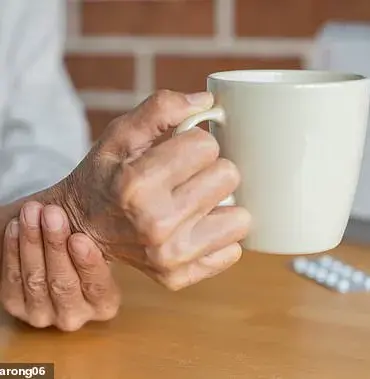 77-Year-Old Watford Resident's Persistent Right-Hand Tremor Sparks Health Concerns